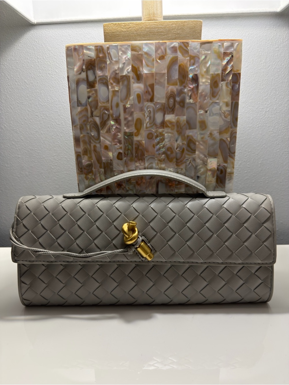 Bottega Veneta Woven Light Gray Leather Top-Handle Clutch with Gold Knot